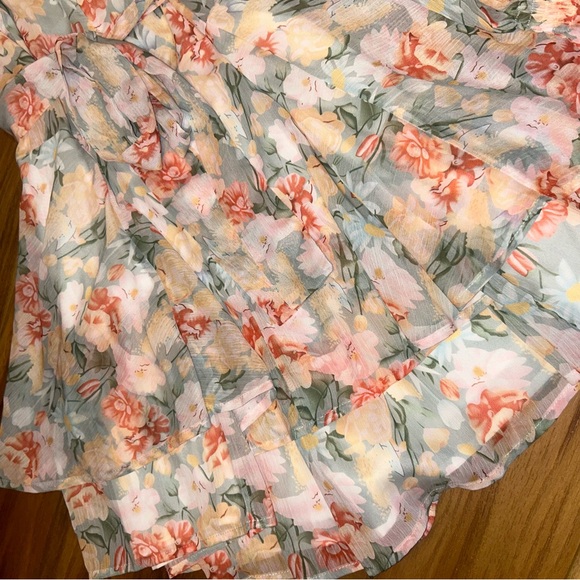 NWOT Floral Long Sleeve Romper with tie in the back and smocked sleeves - Picture 7 of 8